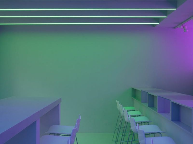 Modern minimal training space with neon purple accents